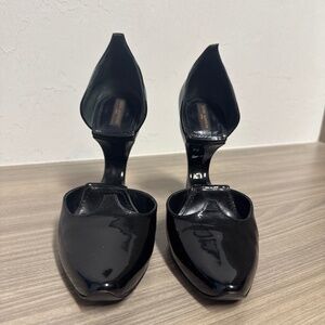 Louis Vuitton black patent leather pumps.